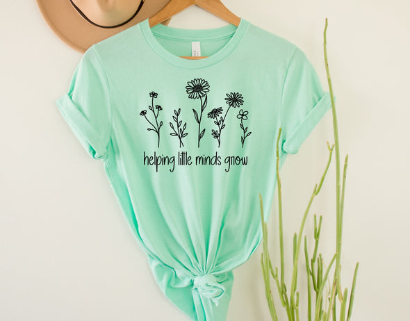 Helping Little Minds Grow Graphic Tee